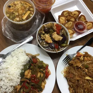 three plates of food on a table