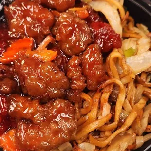 a plate of chinese food on a table