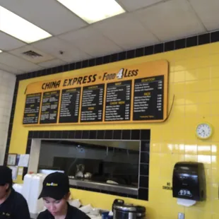 two people working at a counter