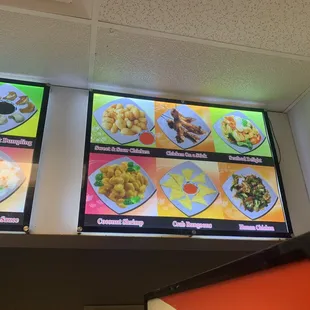 menus on a wall in a restaurant