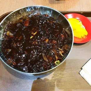 a bowl of food on a tray