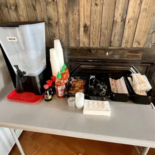 a table with a variety of condiments