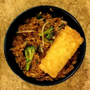 a bowl of rice and broccoli