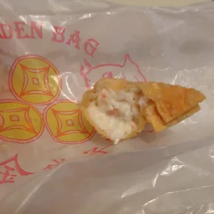 The insides of the crab rangoon! Pretty stuffed, but not all gooey.
