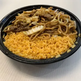 a bowl of noodles and meat