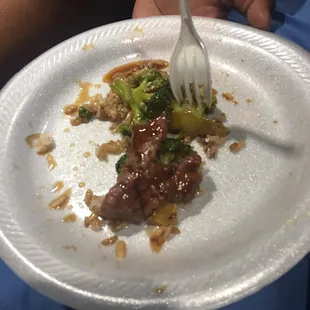 a plate of food with a fork in it