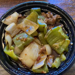 a bowl of stir fried vegetables