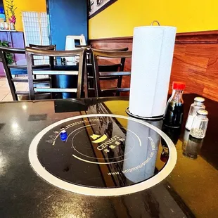 a table and chairs in a restaurant