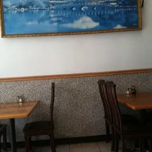 a table and chairs in a restaurant