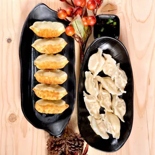 a plate of dumplings and a plate of dumplings