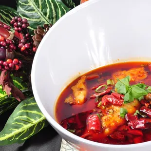 a bowl of soup with vegetables