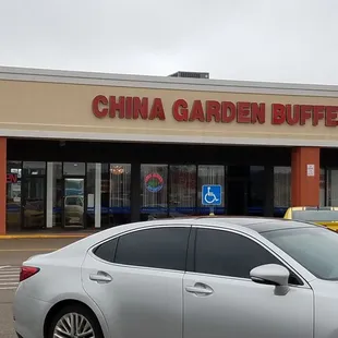 a car parked in front of a chinese garden buffet