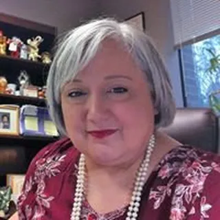 Joan W.