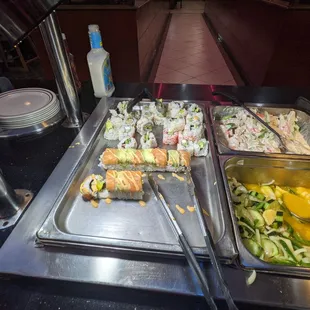 a buffet with a variety of food items