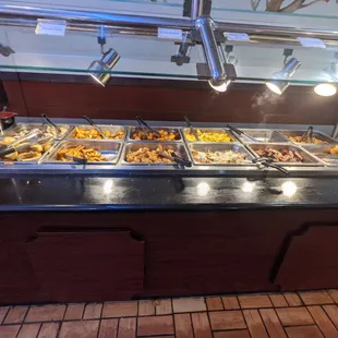 a buffet with a variety of food items