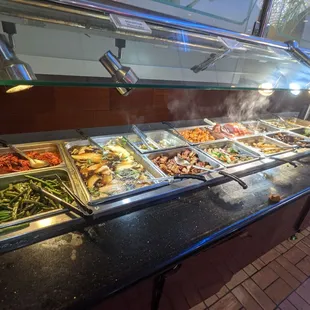 a buffet with many different types of food