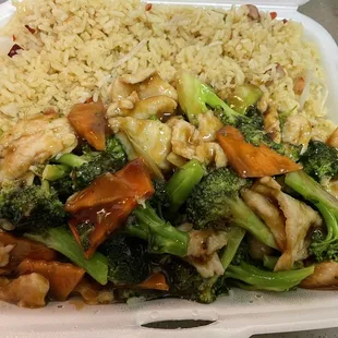 Pork fried rice with chicken and broccoli.