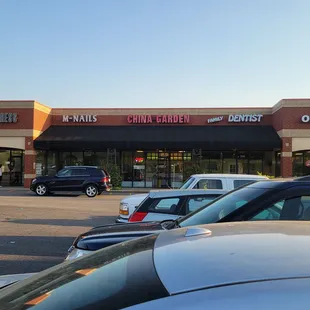 cars parked in front of the store