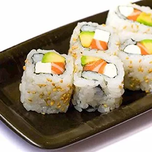 a plate of sushi rolls
