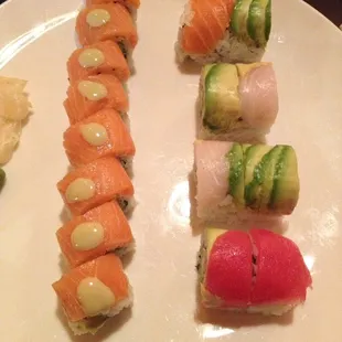Roll w/ Smoke Salmon on Left. Rainbow Roll on Right.