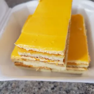 a stack of cheesecakes on a plate