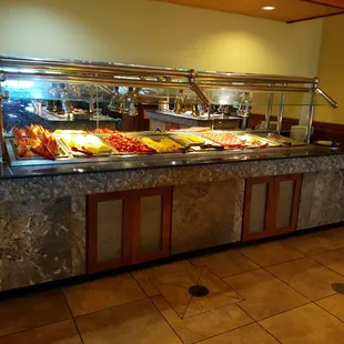 a buffet with a variety of foods