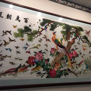 Beautiful embroidery and silk artwork. Adds to your gastronomic experience.