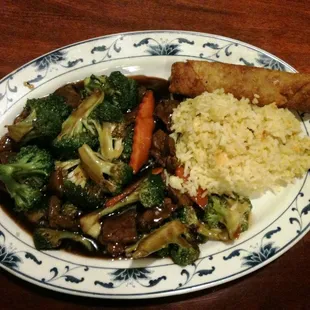 a plate of food with rice and vegetables