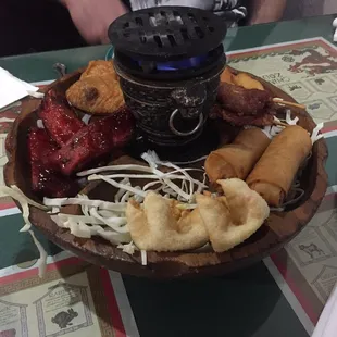 Poopoo platter. So crunchy! Only ate 1/4 cuz we wanted to enjoy our dinner. It heated up like a champ in the toaster oven!