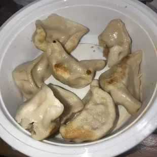 Undercooked fried pork dumplings