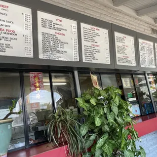 Menu board above the counter.