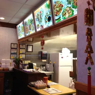 a view of the kitchen from the dining area