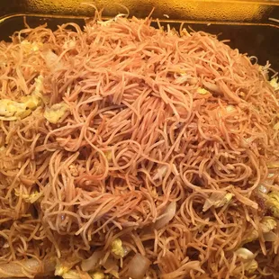 a dish of noodles and meat