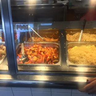 a buffet with a variety of food items