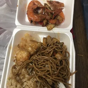 two take out containers of food