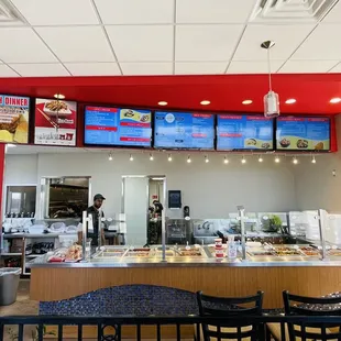 a restaurant counter and menus