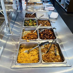 a buffet with many different types of food
