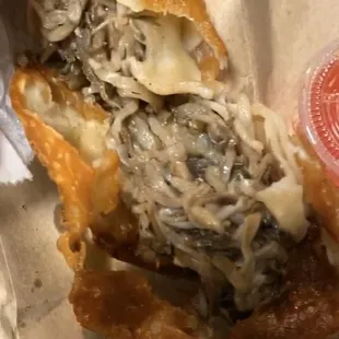 Eggroll (chicken &amp; shrimp) is what the cashier stated, but it looks like trash and smells AWFUL.