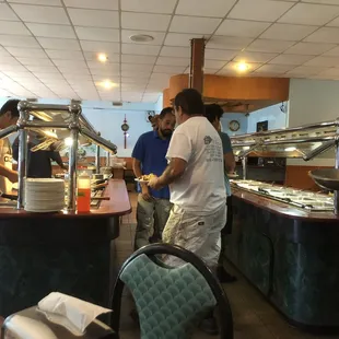 a group of people in a restaurant