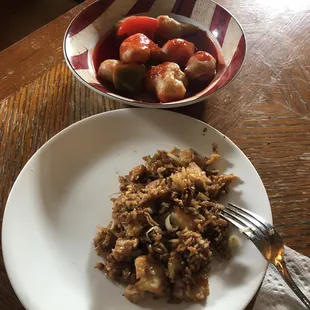 Sweet and sour chicken with fried brown rice.