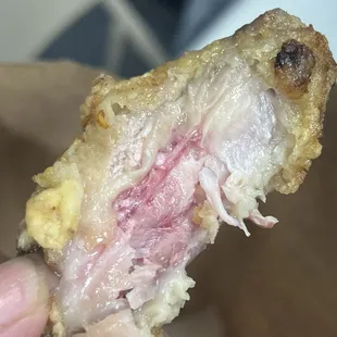 All chicken wings is uncooked.