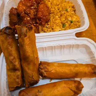 Orange Chicken with Fried Rice mini plate. This is 2 orders of egg rolls *which were full of oil (one bite each person- tossed them).