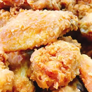 a pile of fried chicken wings