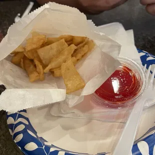 Complimentary Wonton Strips with Sweet and Sour Sauce