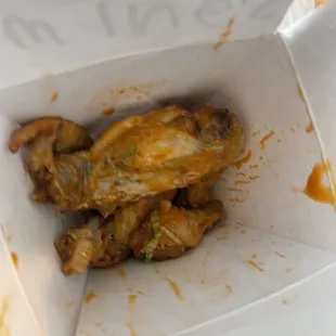 chicken wings in a paper box