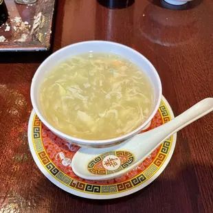 a bowl of soup on a plate