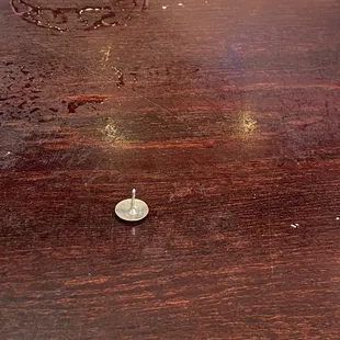 The nail  that fell from China harbor ceiling into my moms food...