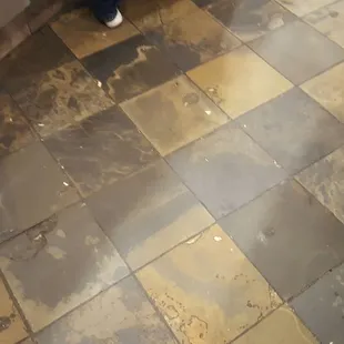 Nasty floors in this dining establishment, the food bar didn't look much better.