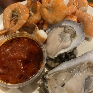 Cocktail shrimp and oyster on a half shell