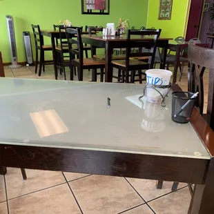 a glass table in a restaurant
